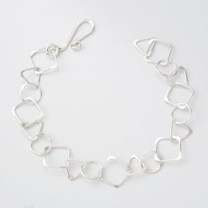 AT13: The Simple Shapes Bracelet Featuring Diamonds Sterling Silver