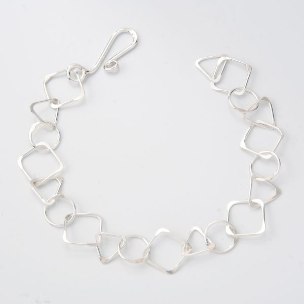 AT13: The Simple Shapes Bracelet Featuring Diamonds Sterling Silver